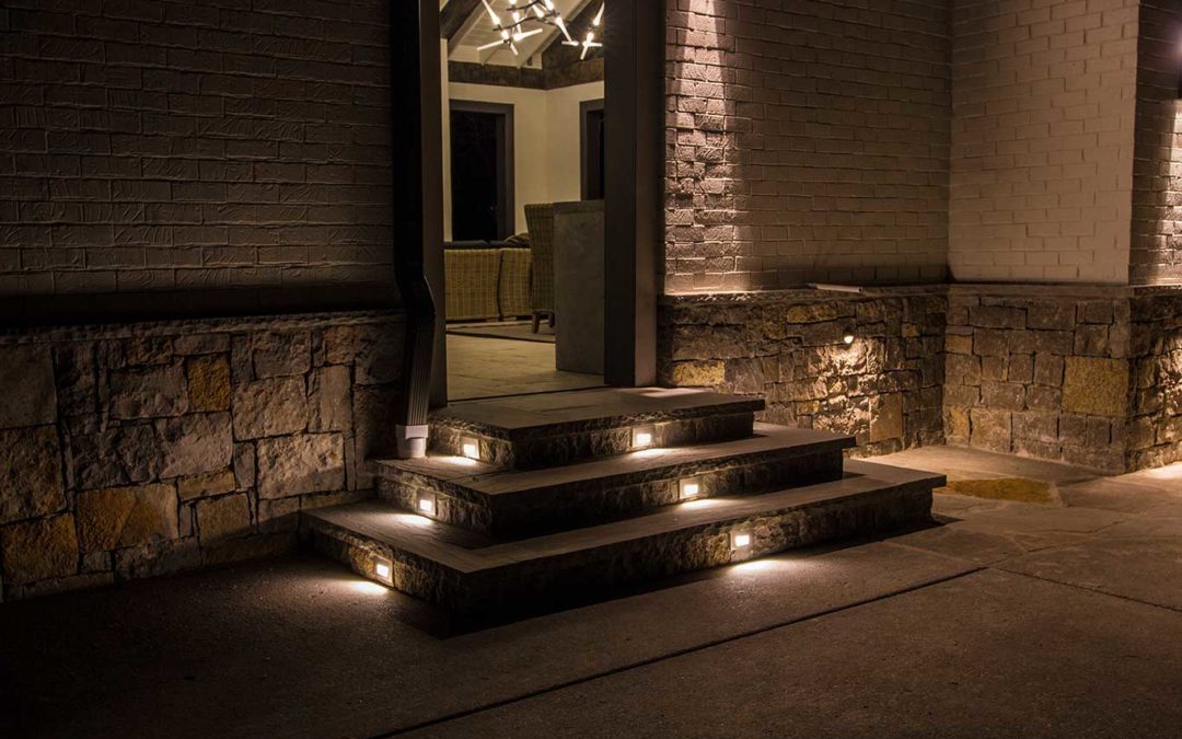 Hardscape step lights leading to outdoor living space