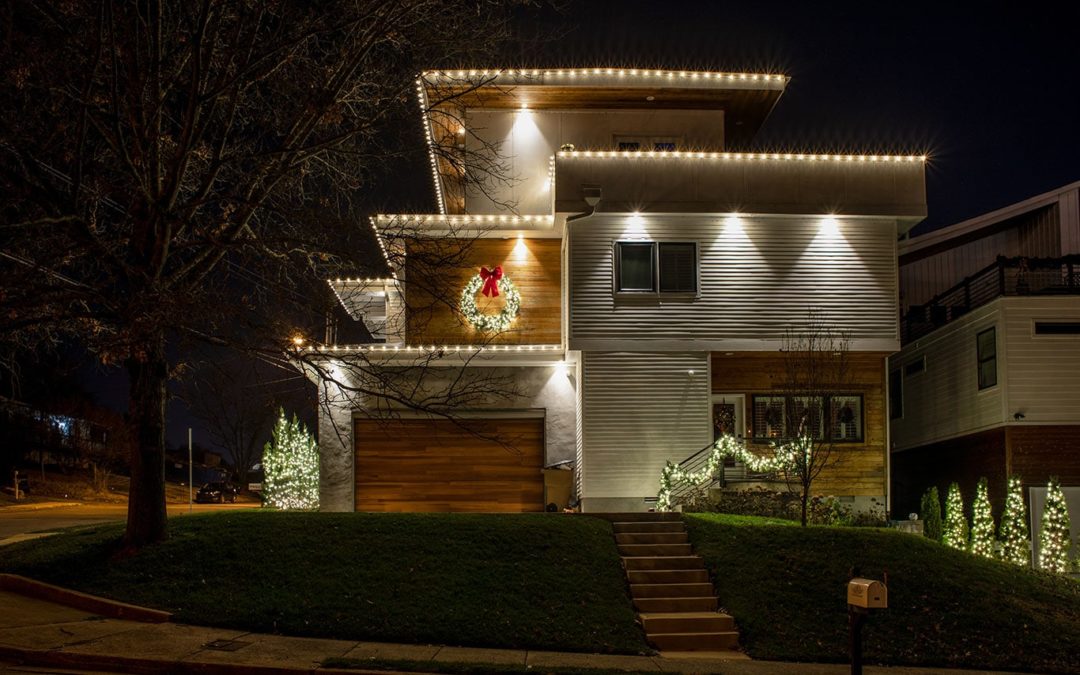 contemporary home with white roofline lights