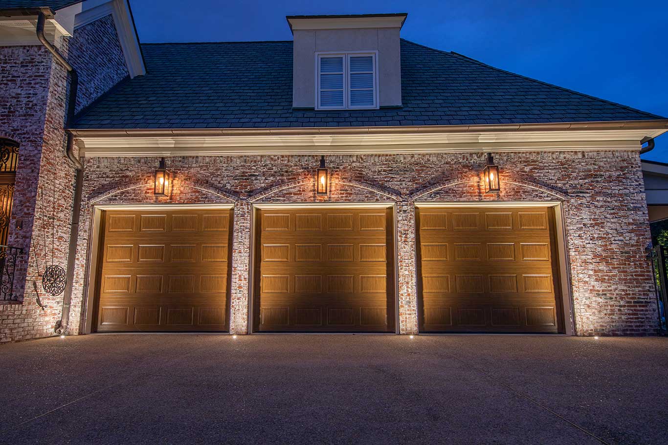 recessed in concrete well up lights lighting exterior of garage
